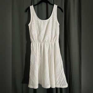 White lace summer dress perfect for any occasion.